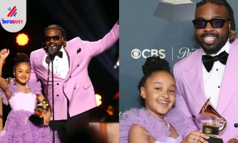 Aura V Becomes Youngest Grammy Winner in History at Age 8 1 Aura V holding her Grammy Award on stage with her father Fyütch